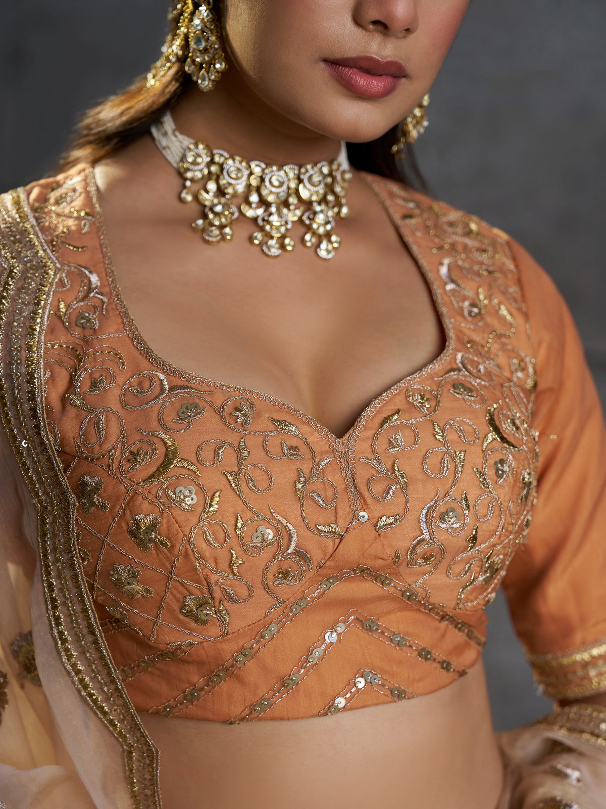 Graceful Peach Zari Embroidered Organza Traditional Lehenga Choli