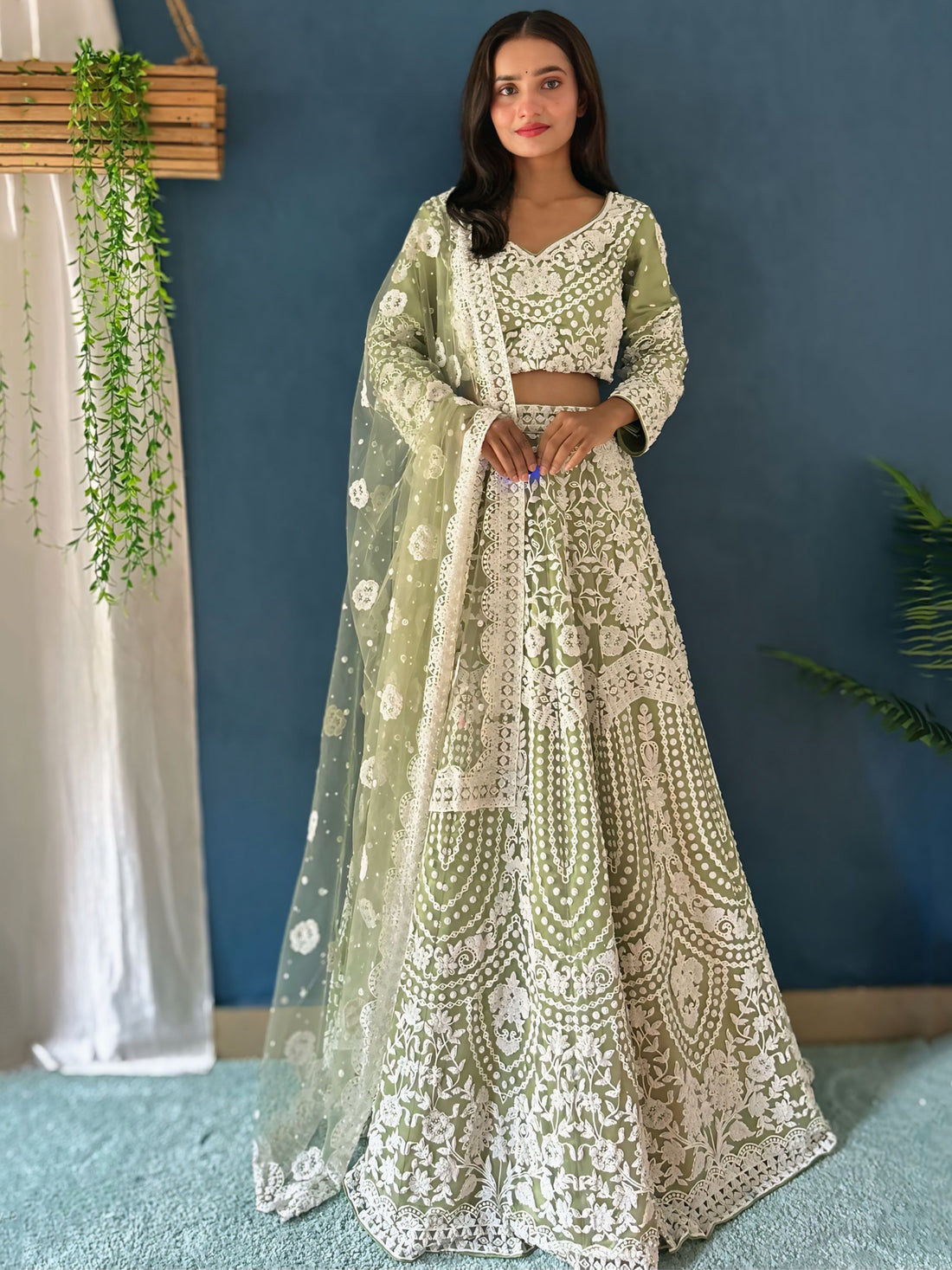 Dazzling Pista Green Pearl Work Net Reception Wear Lehenga Choli