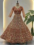 Elegant Orange Embroidered Net Wedding Lehenga Choli With Dupatta