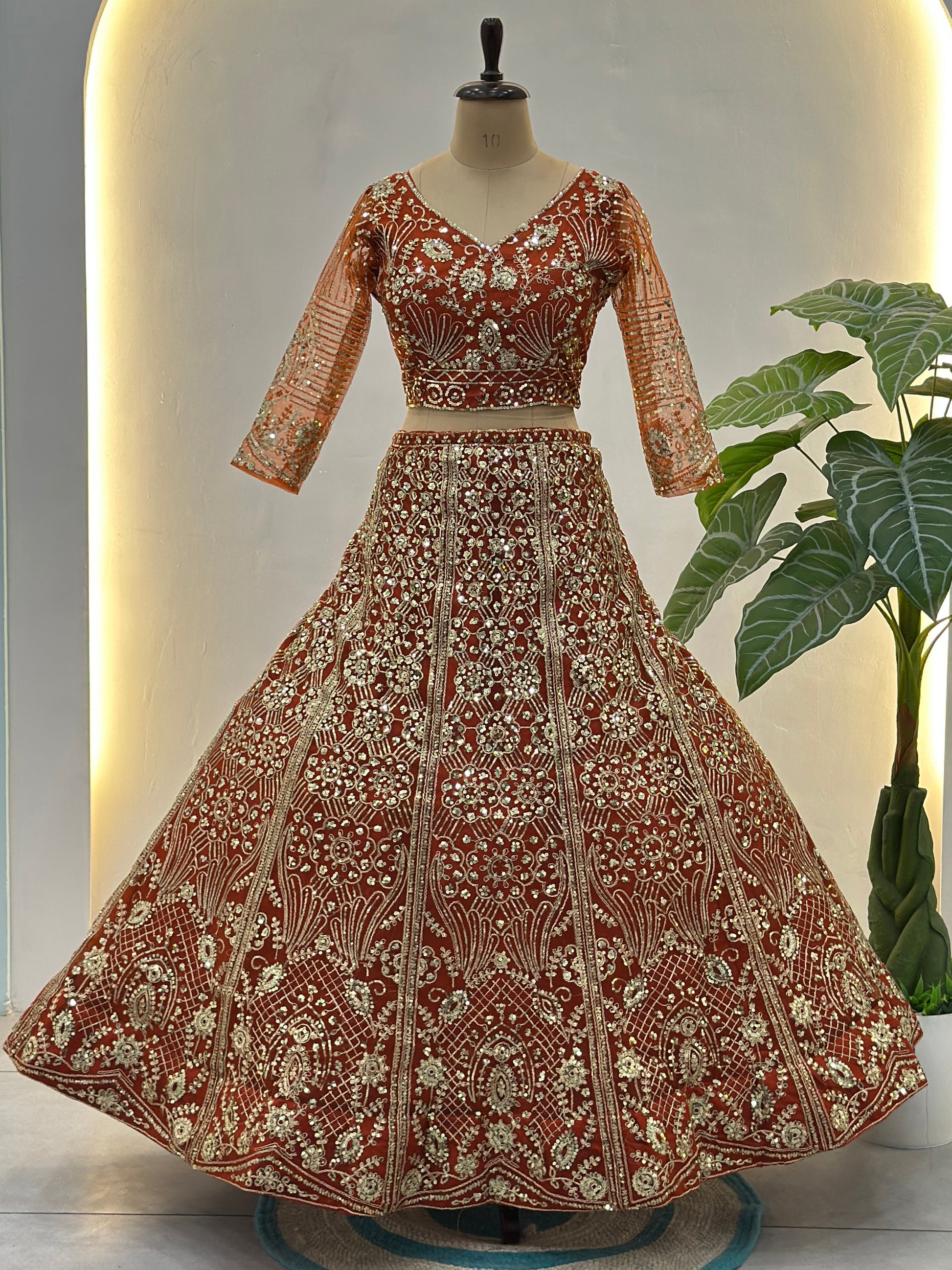 Elegant Orange Embroidered Net Wedding Lehenga Choli With Dupatta