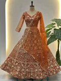 Elegant Orange Embroidered Net Wedding Lehenga Choli With Dupatta