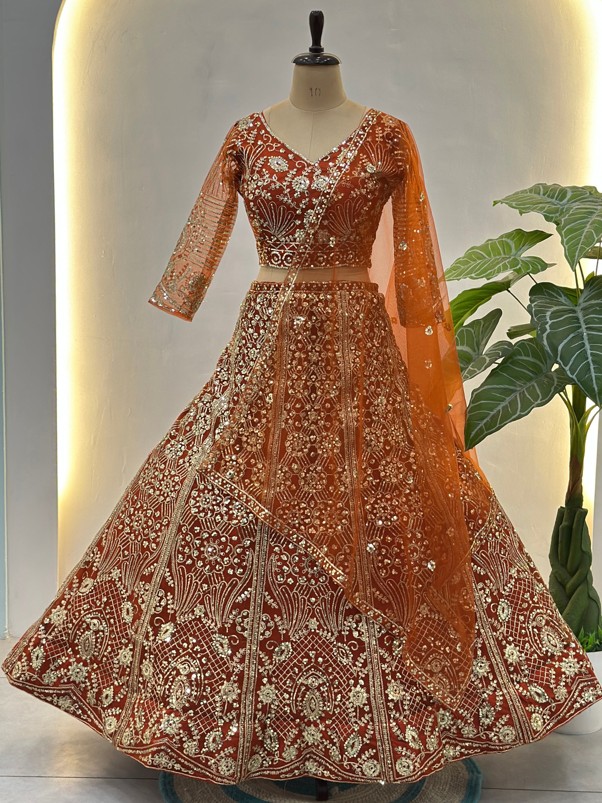 Elegant Orange Embroidered Net Wedding Lehenga Choli With Dupatta