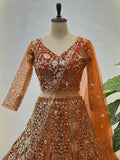 Elegant Orange Embroidered Net Wedding Lehenga Choli With Dupatta