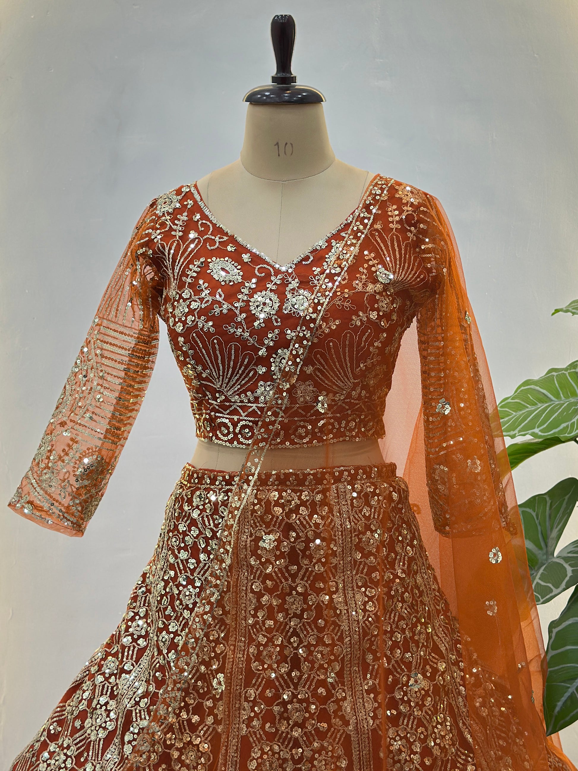 Elegant Orange Embroidered Net Wedding Lehenga Choli With Dupatta