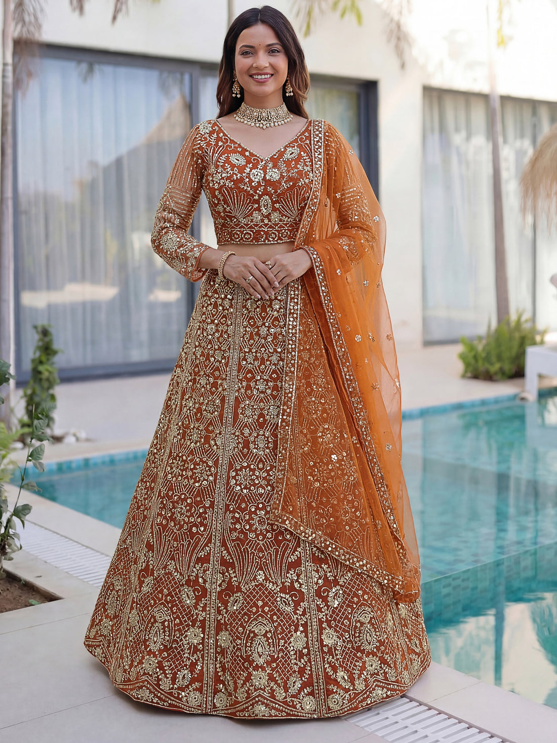 Elegant Orange Embroidered Net Wedding Lehenga Choli With Dupatta