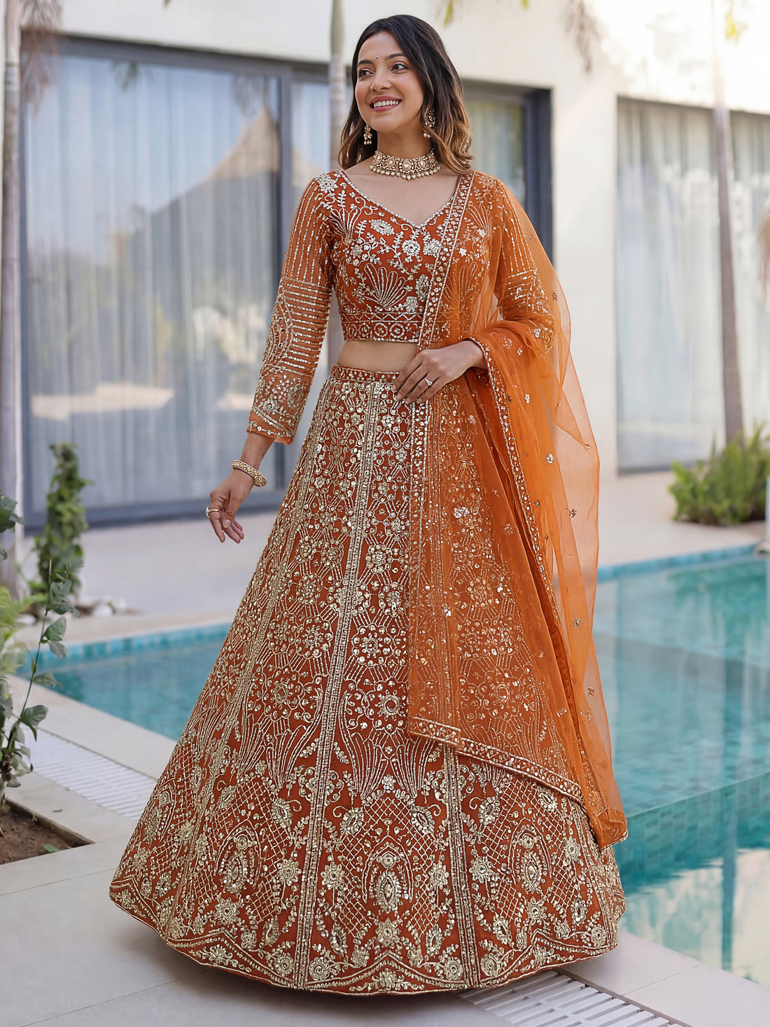 Elegant Orange Embroidered Net Wedding Lehenga Choli With Dupatta