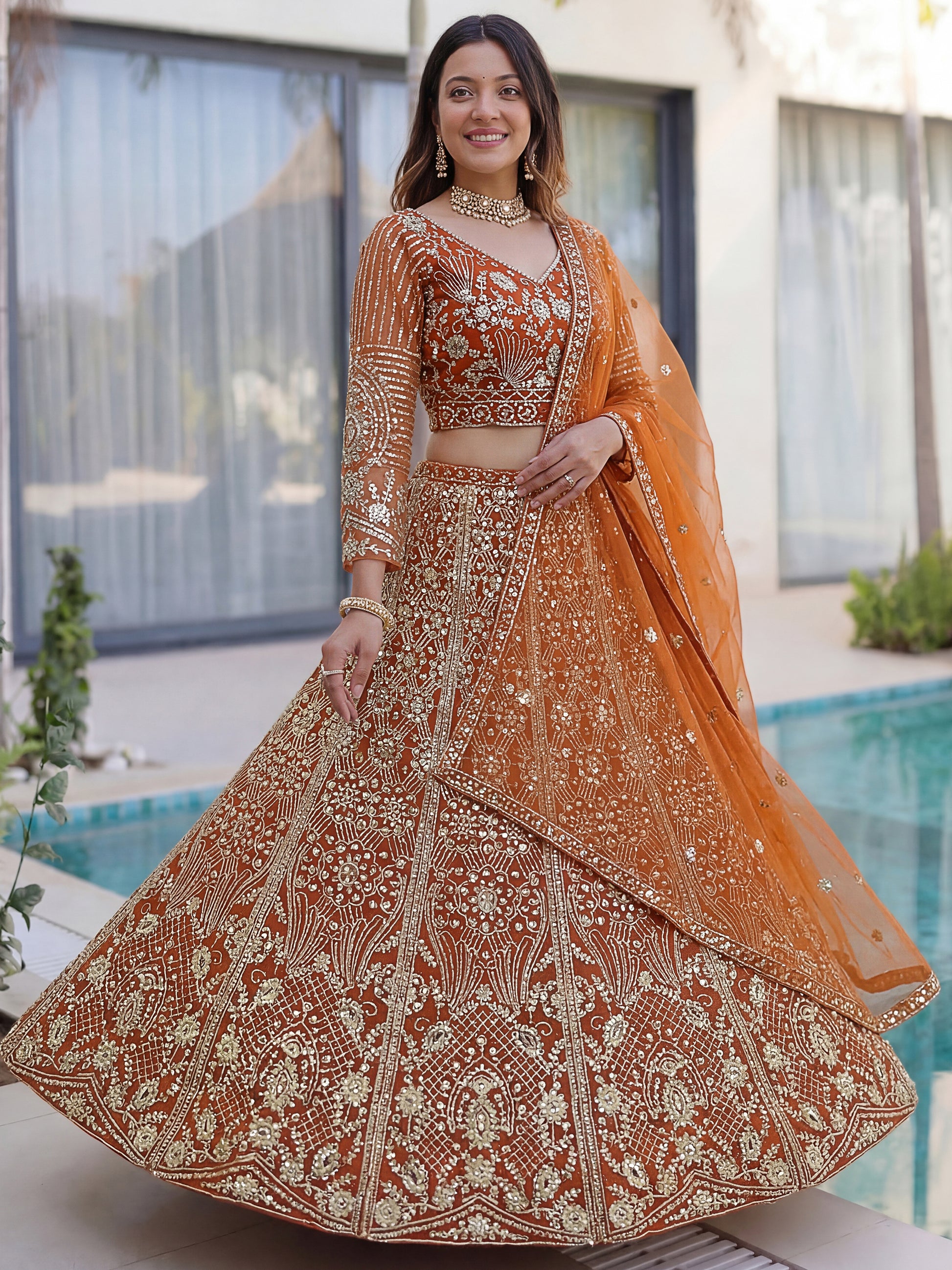 Elegant Orange Embroidered Net Wedding Lehenga Choli With Dupatta