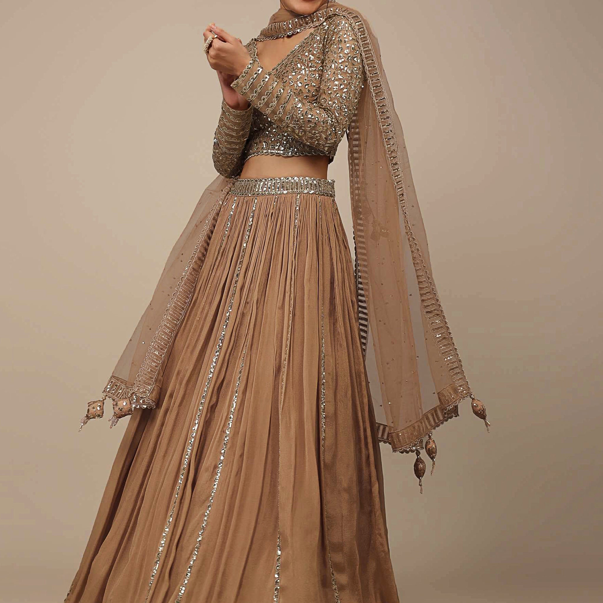 Enchanting Beige Sequins Georgette Engagement Wear Lehenga Choli