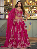 Enchanting Rani Pink Embroidered Silk Wedding Wear Lehenga Choli With Dupatta