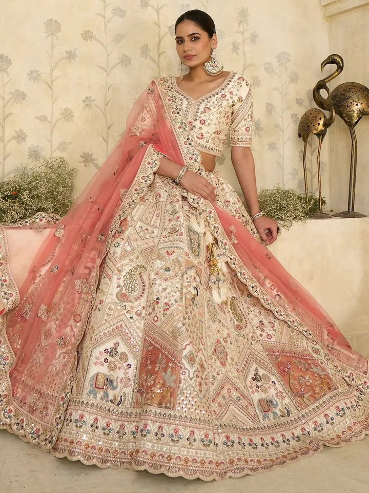 Stellar Cream Thread Embroidered Silk Bridal Lehenga Choli With Dupatta