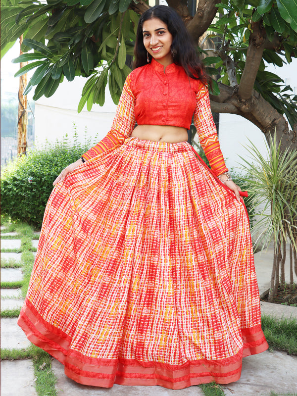 Fabulous Orange Printed Tussar Silk Festival Wear Lehenga Choli