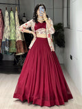Gorgeous Maroon Georgette Wedding Wear Lehenga Choli With Printed Jacket