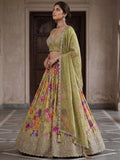 Dazzling Green Embroidered Tissue Festive Wear Lehenga Choli With Dupatta