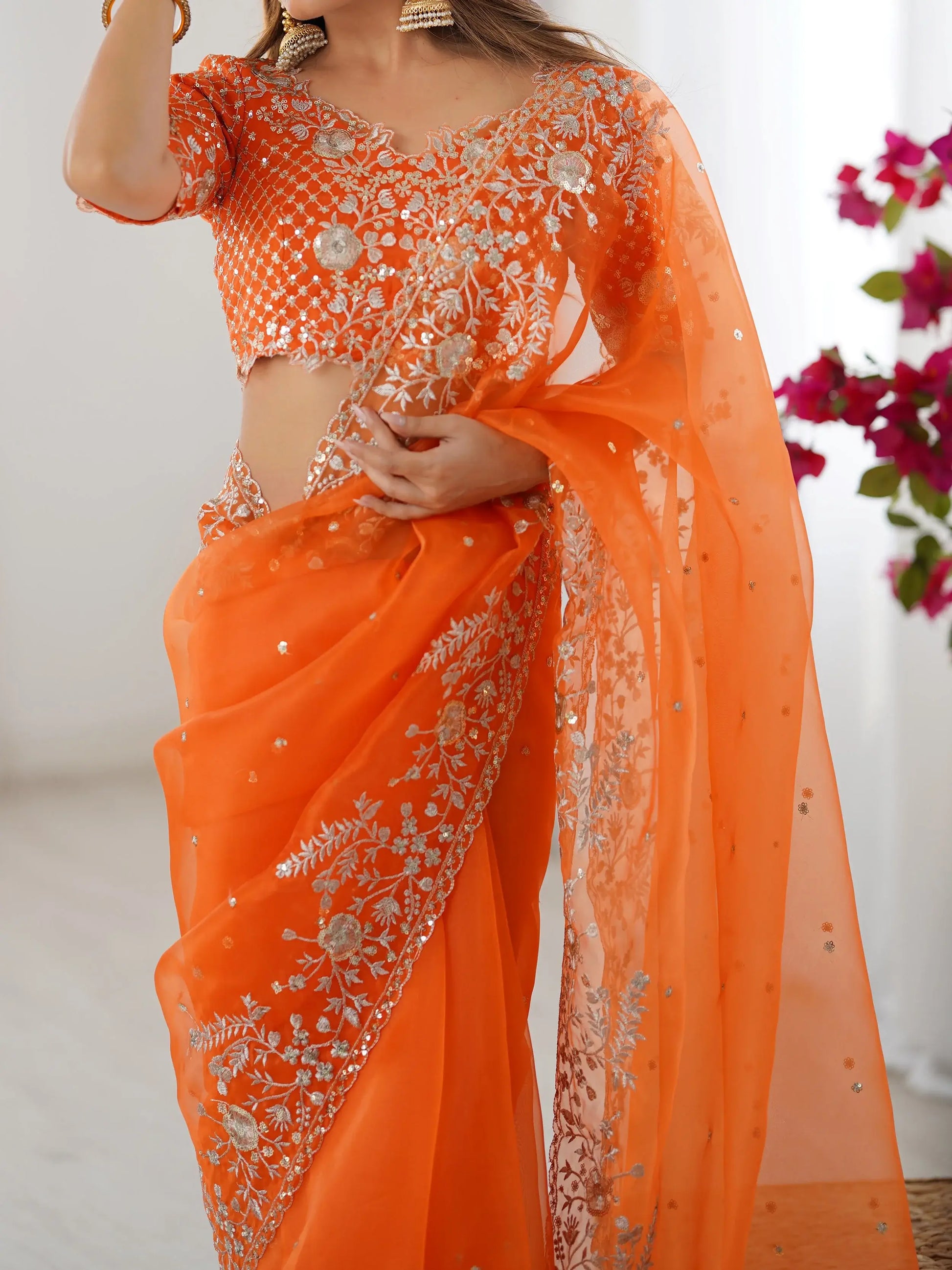 Enchanting Orange Sequins Organza Festive Wear Saree With Blouse