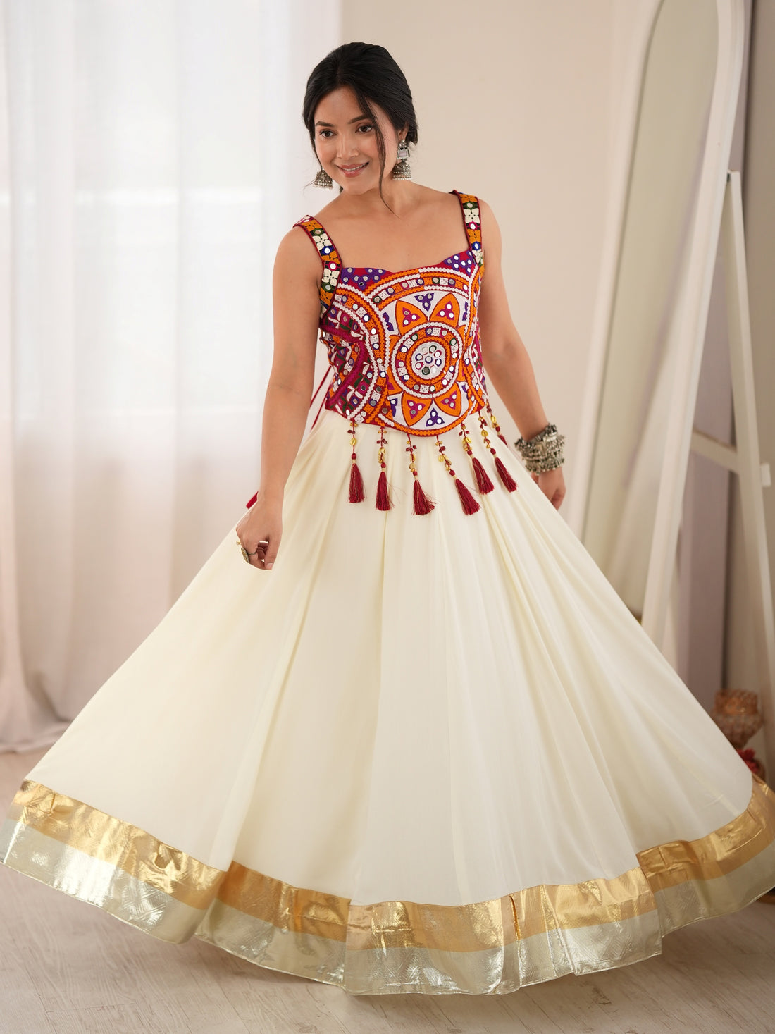 Graceful Cream Mirror Work Rayon Navratri Wear Lehenga Choli