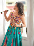Notable Teal Green Mirror Work Rayon Navratri Wear Lehenga Choli
