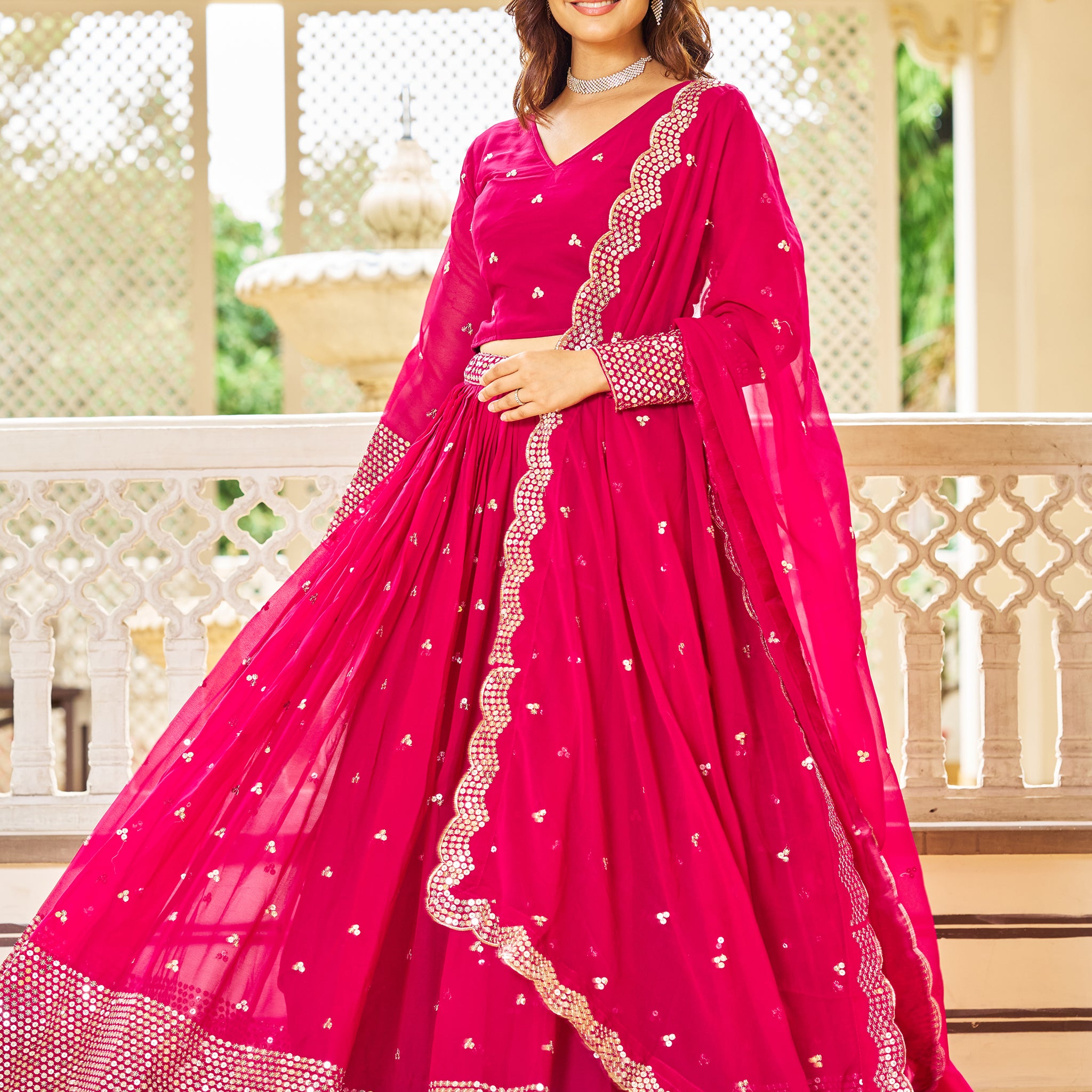 Alluring Pink Sequins Georgette Engagement Wear Lehenga Choli