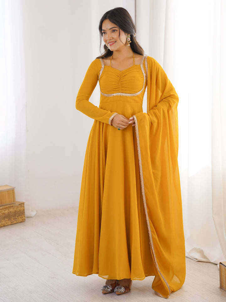Fantastic Yellow Lace Work Georgette Haldi Wear Gown With Dupatta