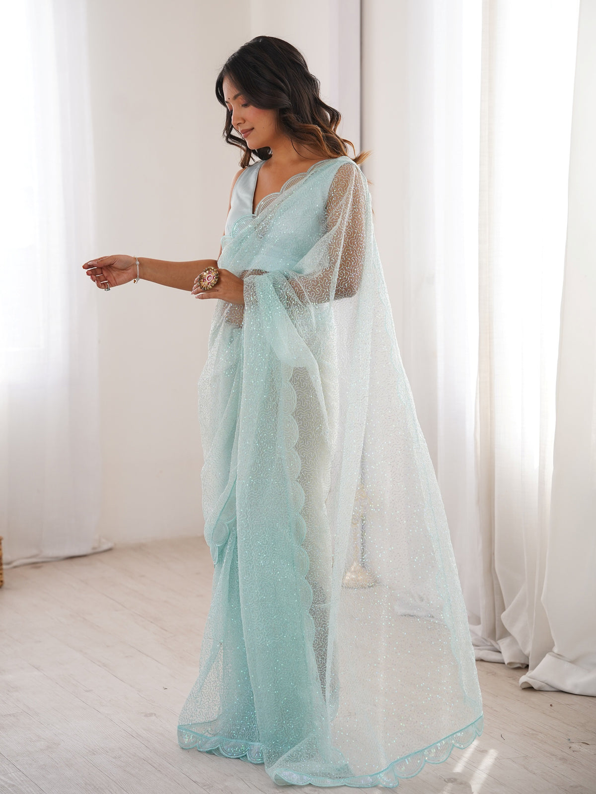 Beautiful Sky Blue Sequins Work Net Wedding Wear Saree With Blouse