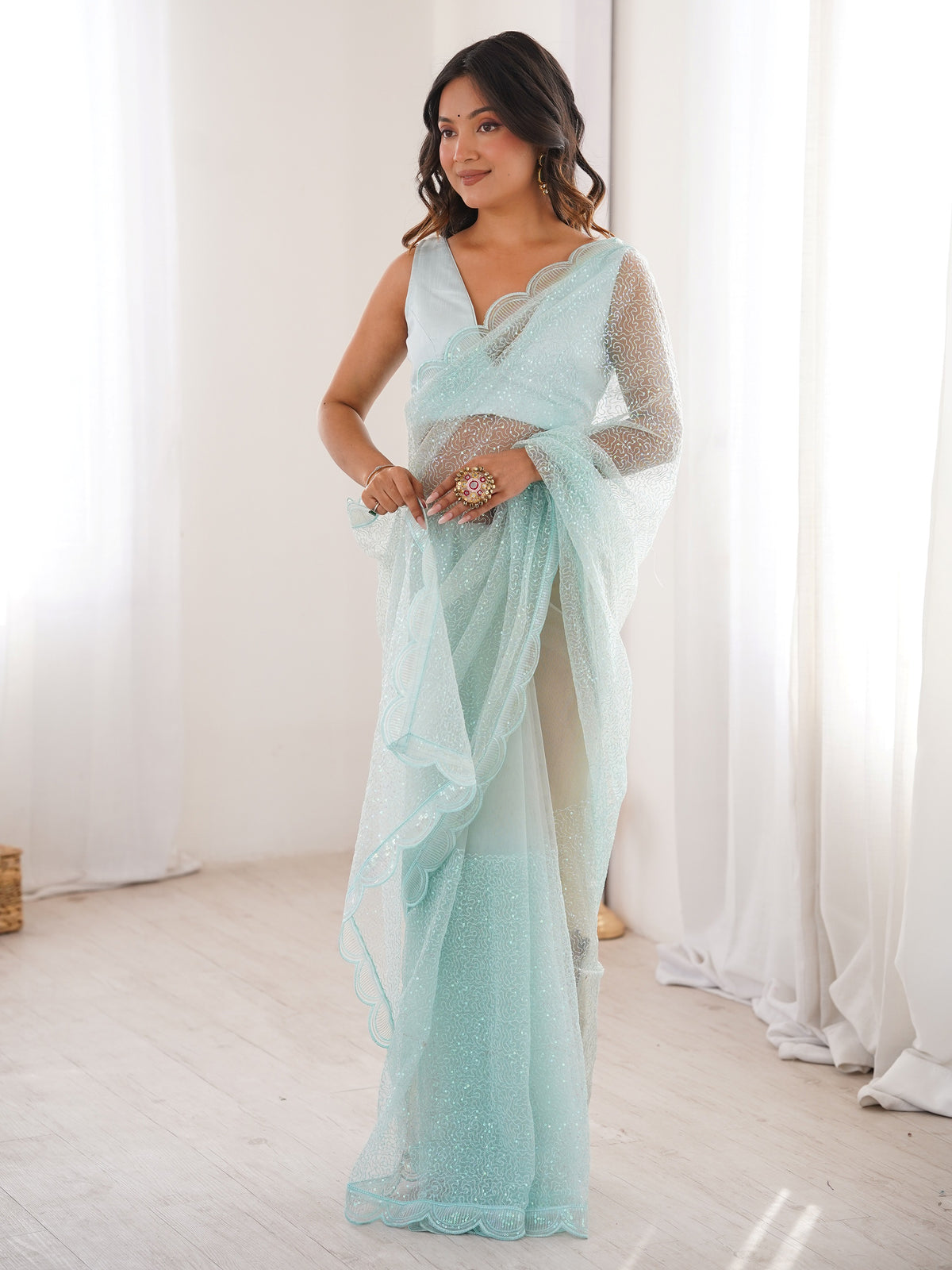 Beautiful Sky Blue Sequins Work Net Wedding Wear Saree With Blouse