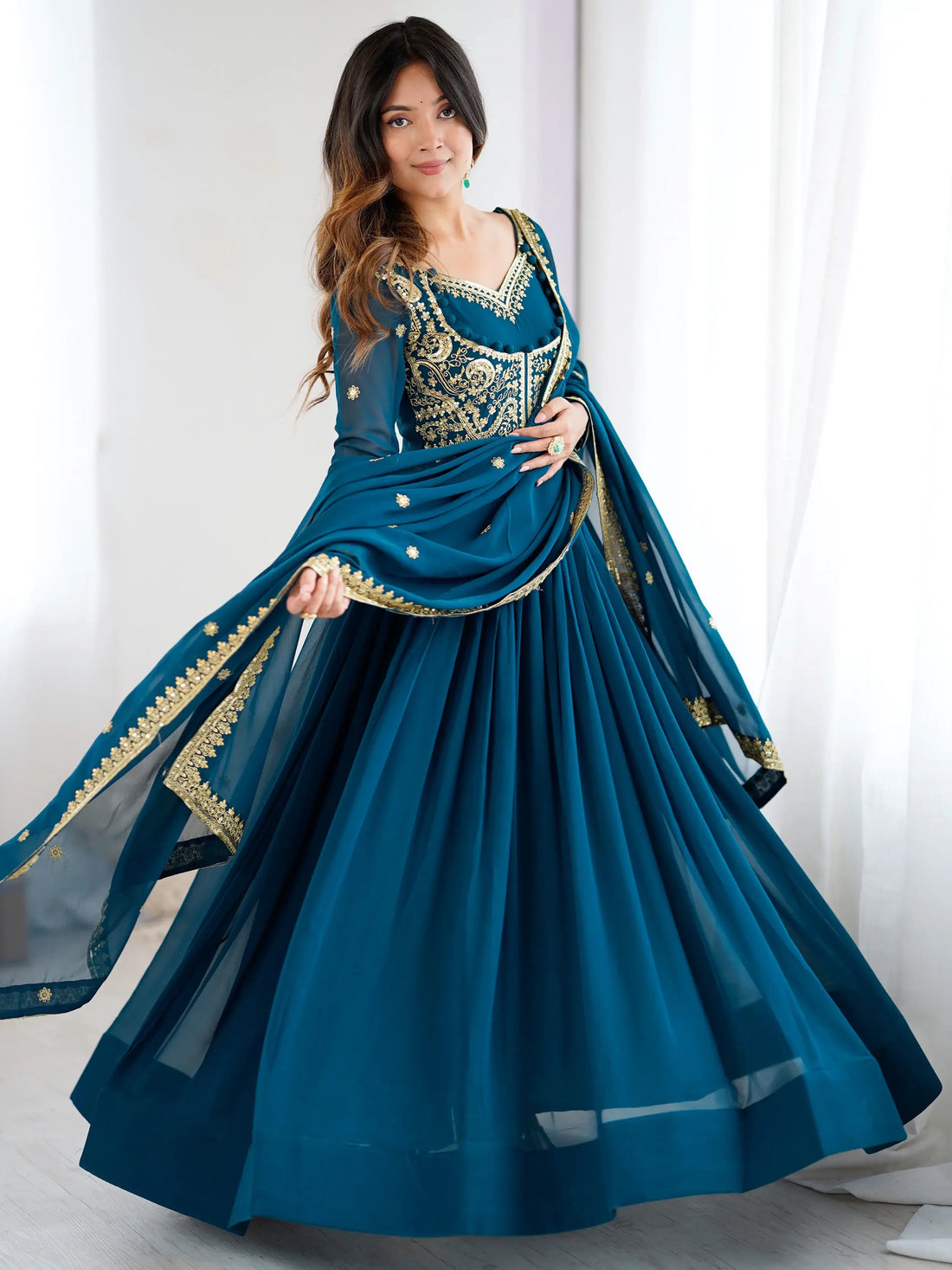 Exclusive Teal Blue Sequins Georgette Festive Wear Gown With Dupatta