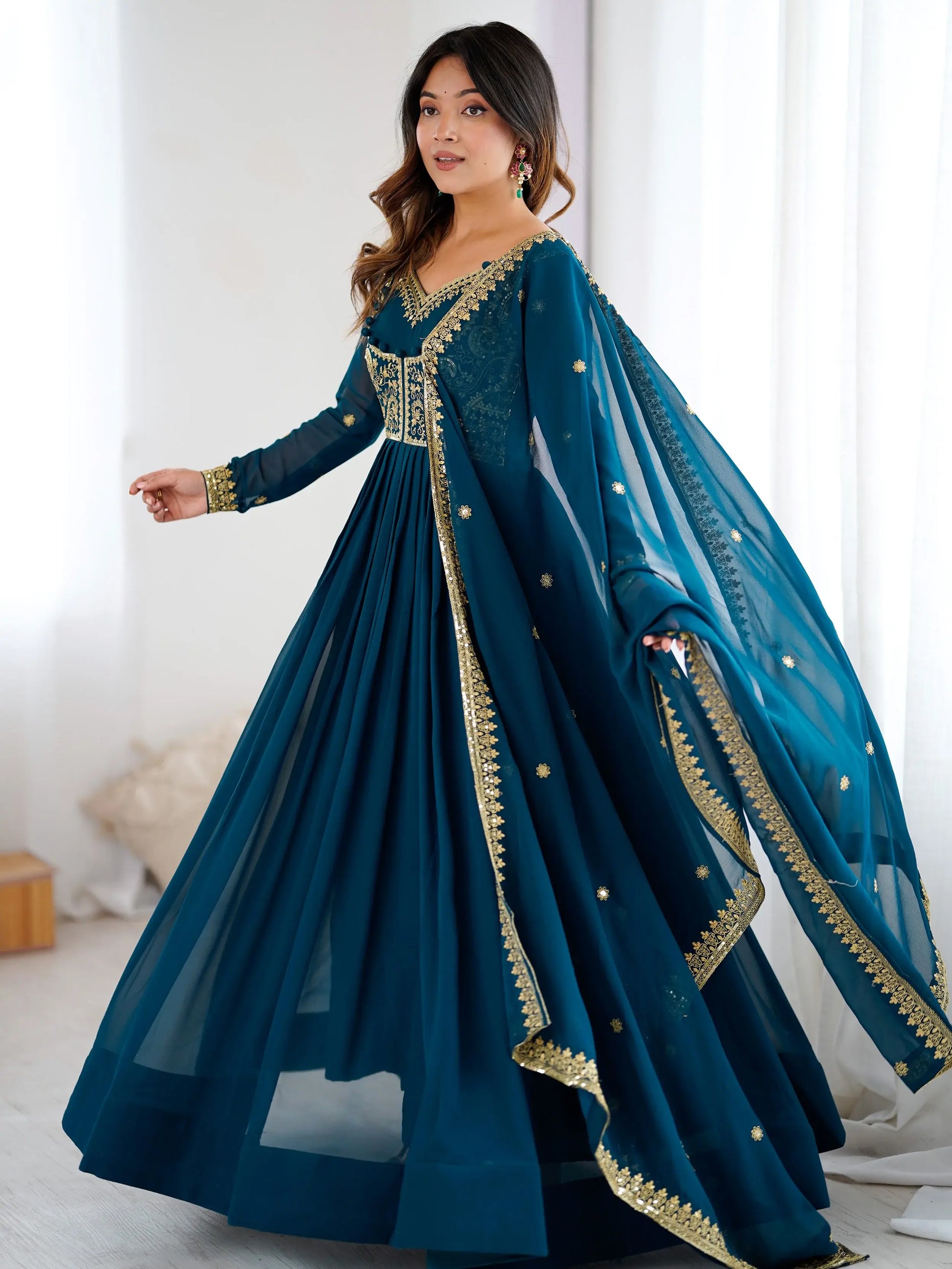Exclusive Teal Blue Sequins Georgette Festive Wear Gown With Dupatta