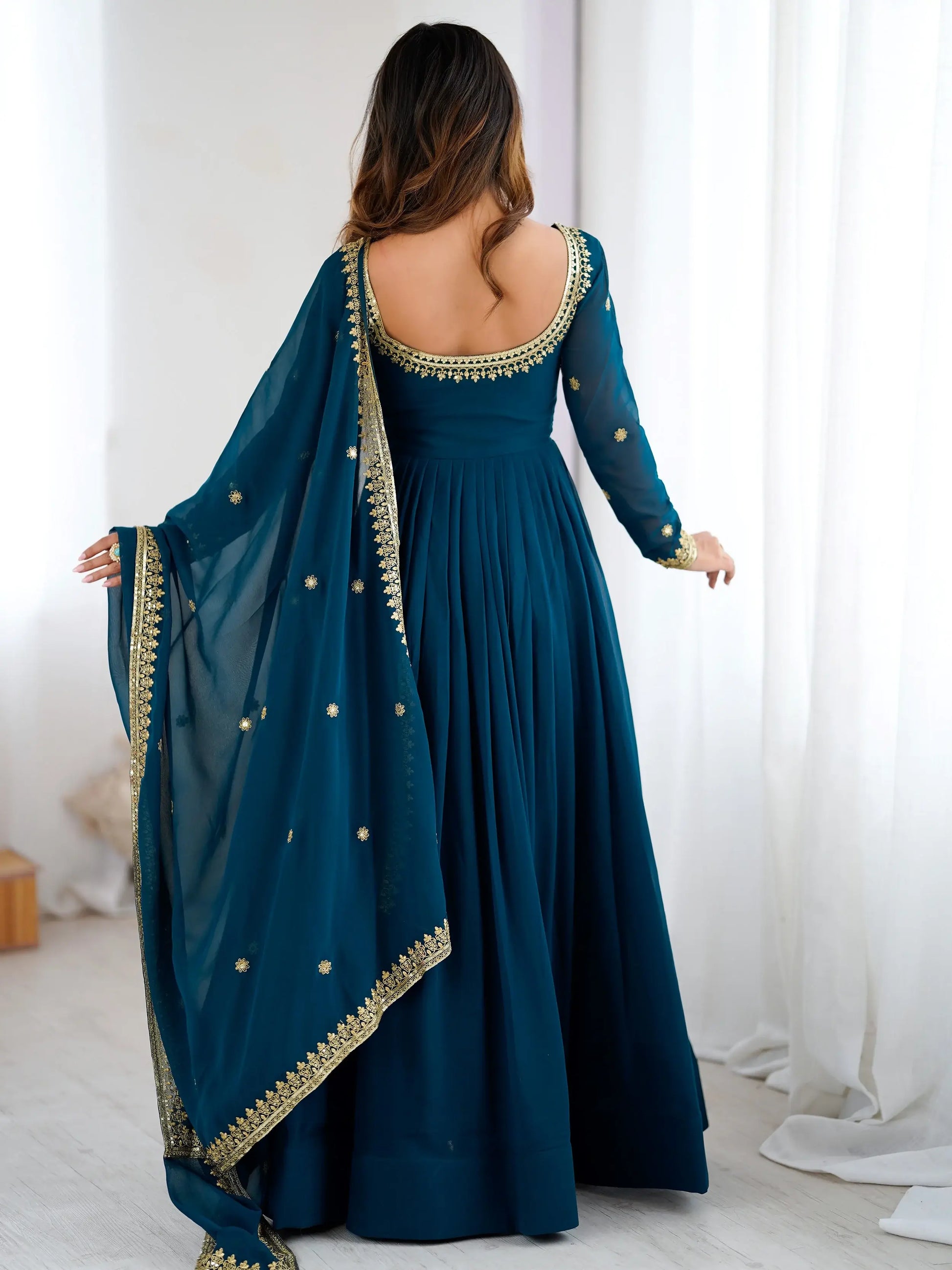 Exclusive Teal Blue Sequins Georgette Festive Wear Gown With Dupatta