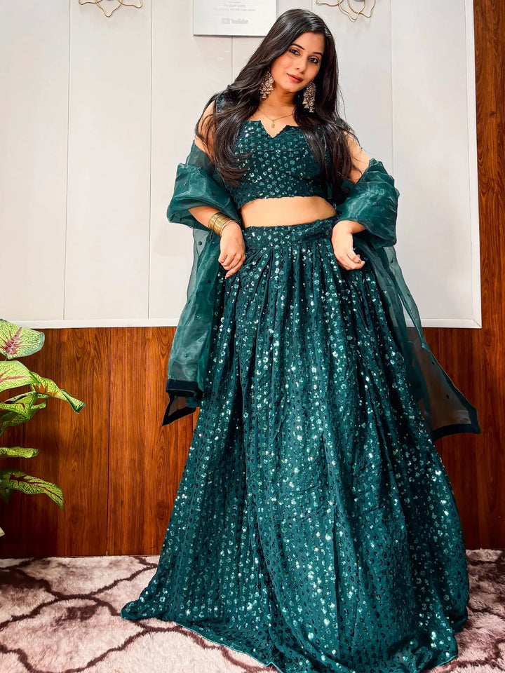 Impressive Teal Green Sequins Georgette Sangeet Wear Lehenga With Blouse