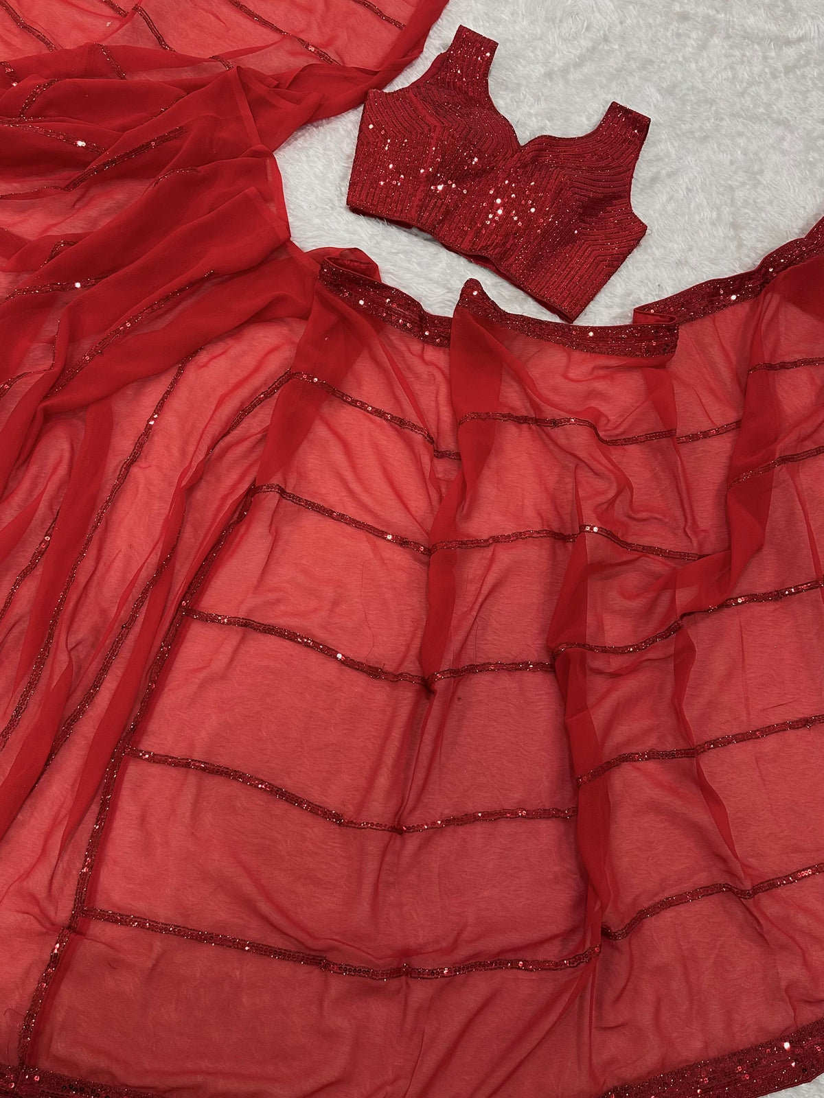 Glamorous Red Sequins Georgette Reception Wear Saree With Blouse