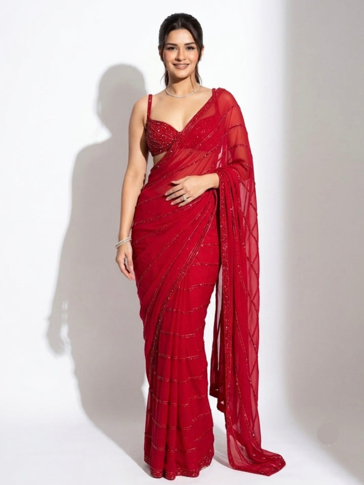 Glamorous Red Sequins Georgette Reception Wear Saree With Blouse
