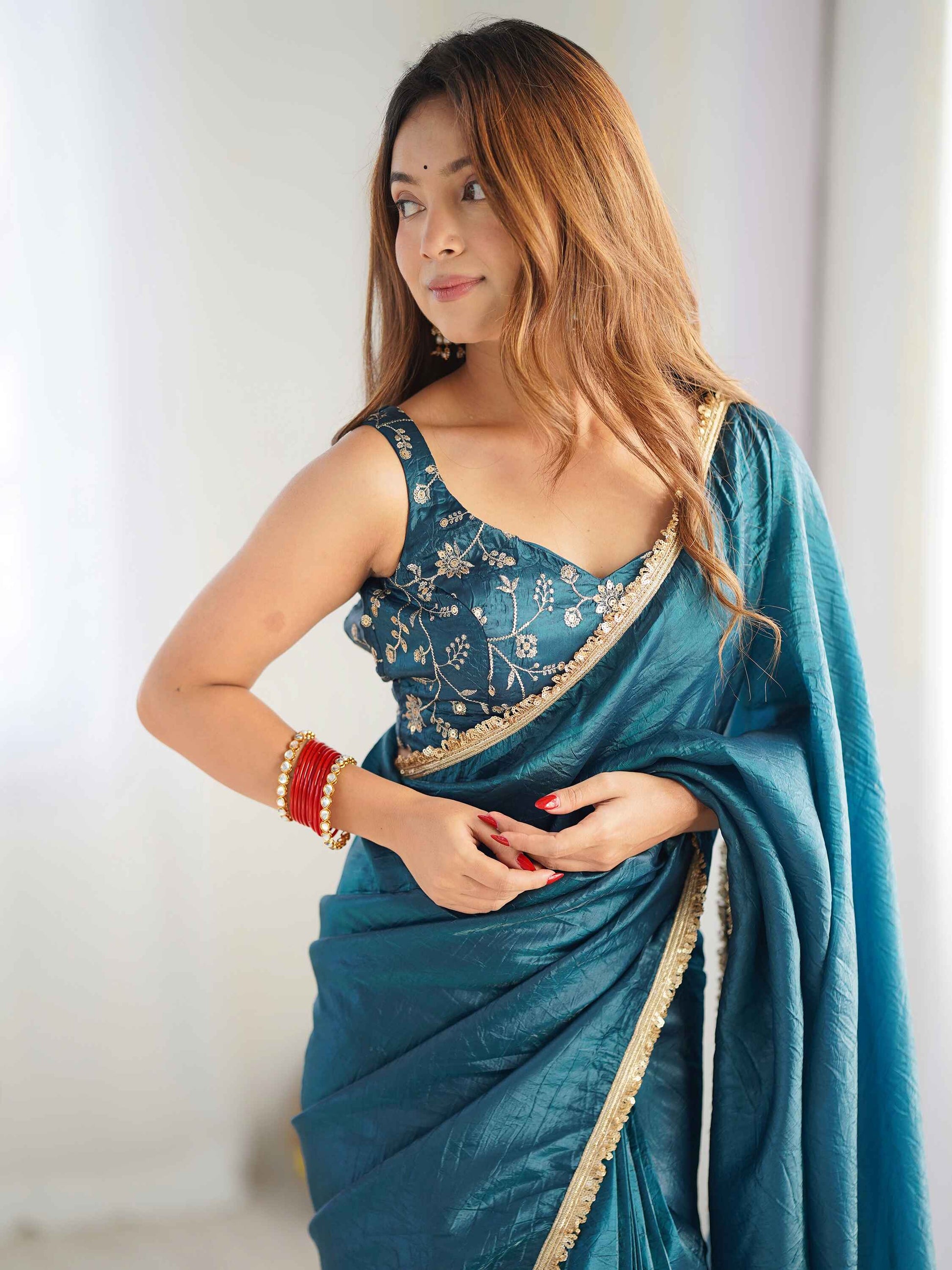 Alluring Teal Blue Tissue Silk Pre Stitched Saree With Blouse