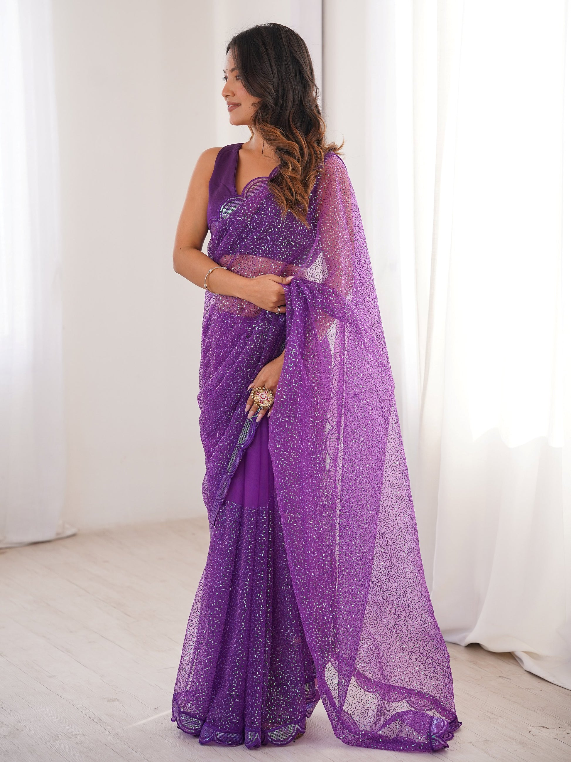 Enchanting Purple Sequin Work Net Wedding Wear Saree With Blouse