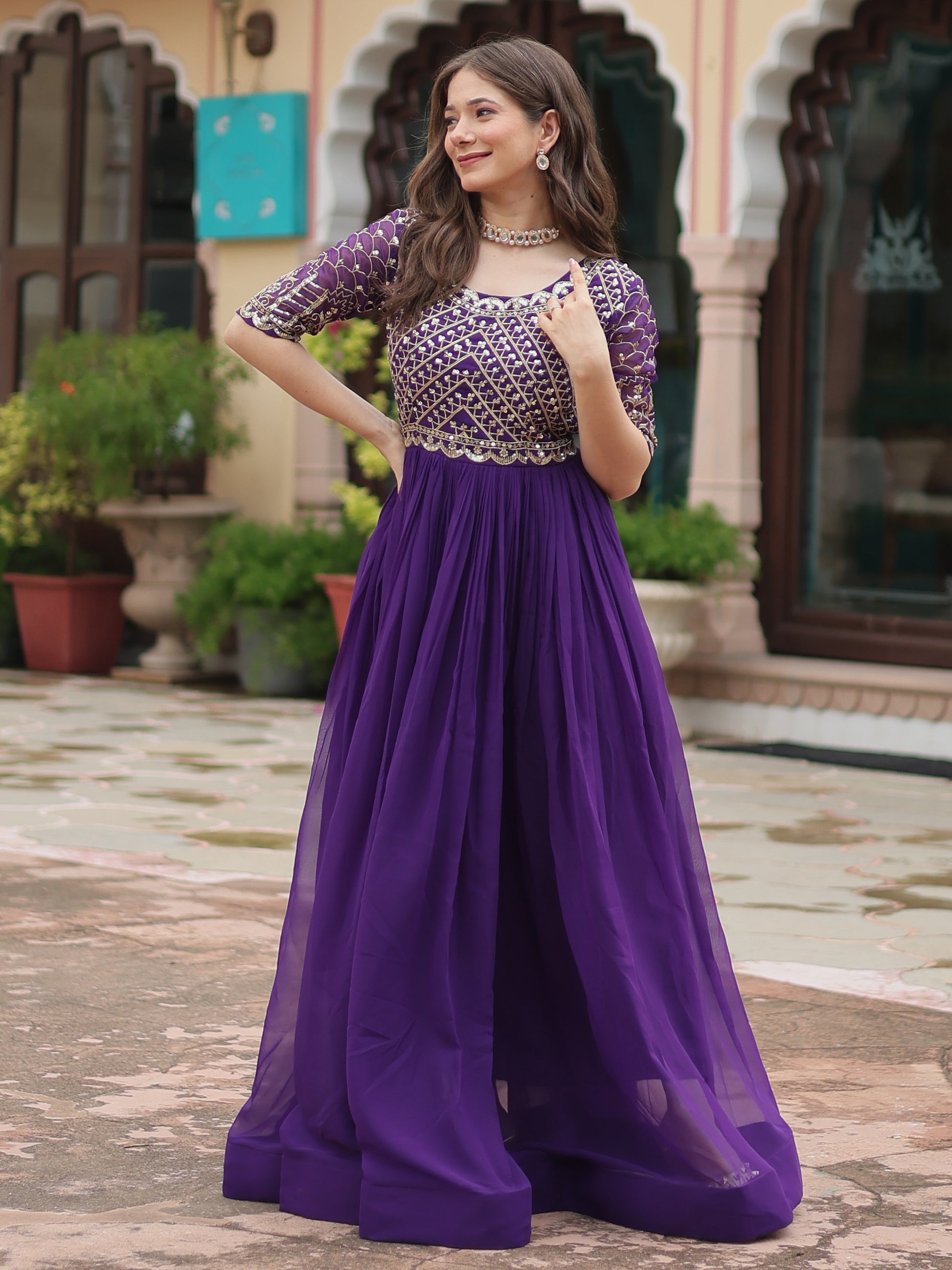 Fabulous Purple Embroidered Georgette Reception Wear Gown
