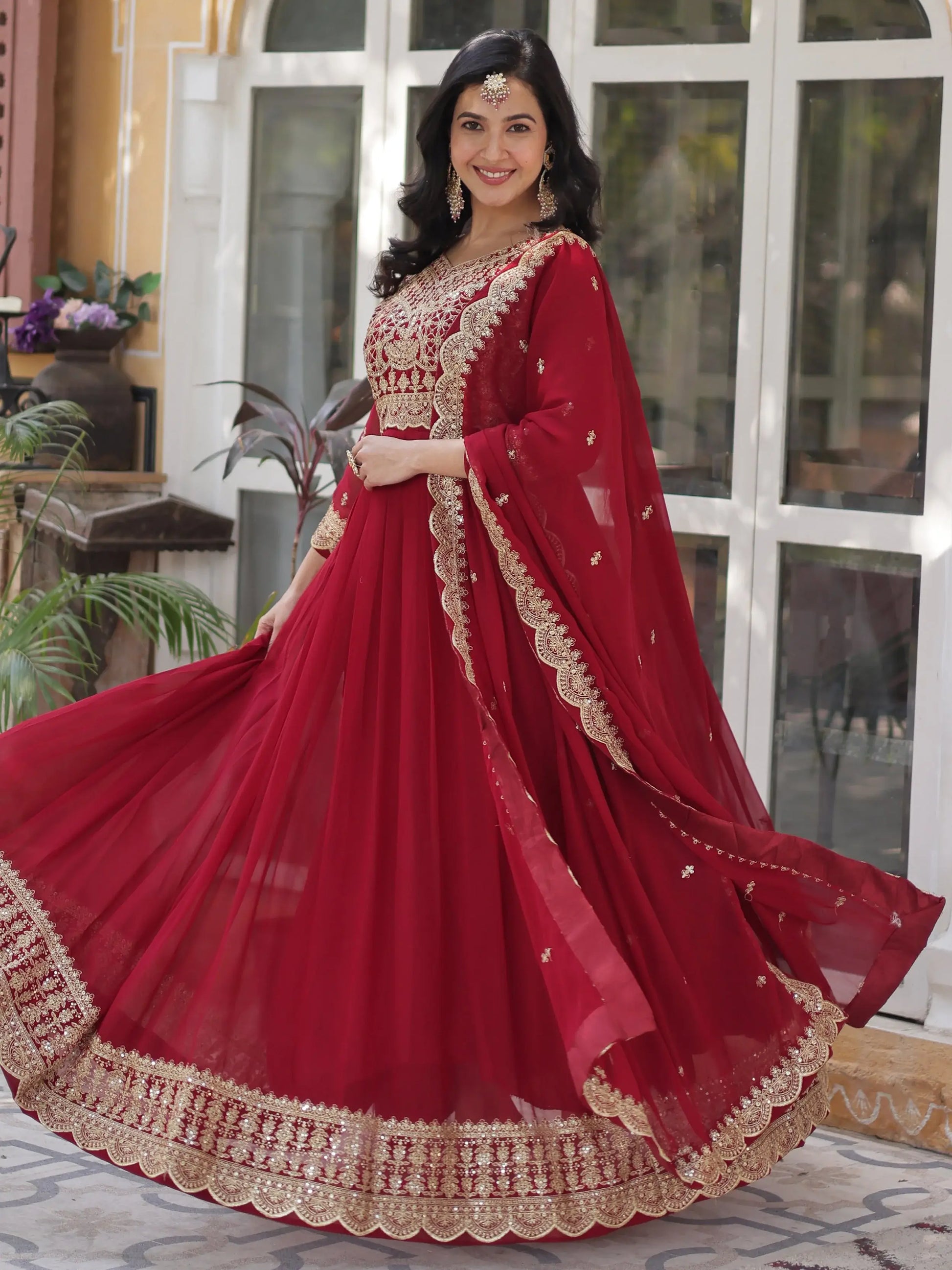 Magnetic Maroon Zari Embroidery Georgette Wedding Wear Gown With Dupatta