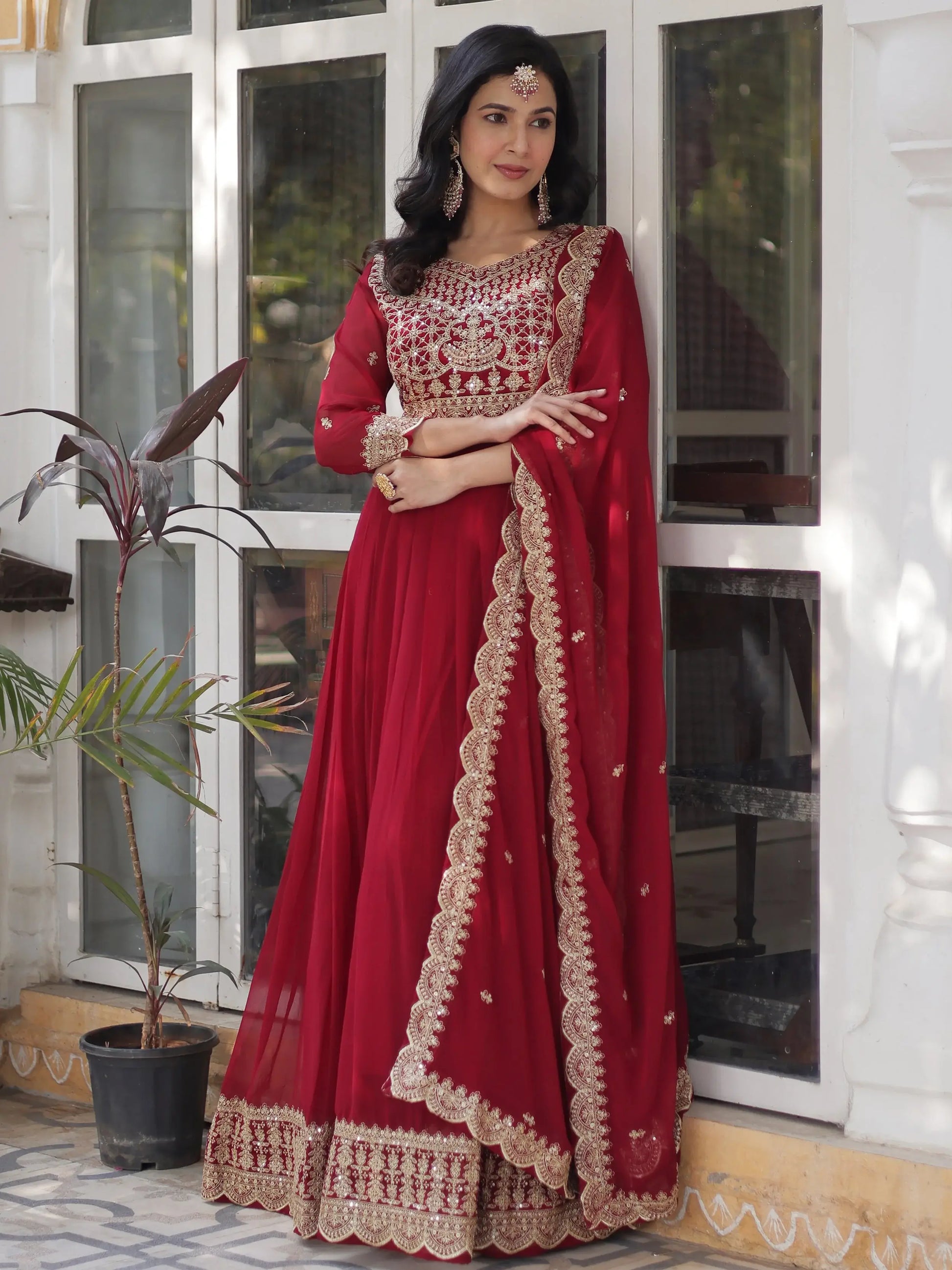 Magnetic Maroon Zari Embroidery Georgette Wedding Wear Gown With Dupatta
