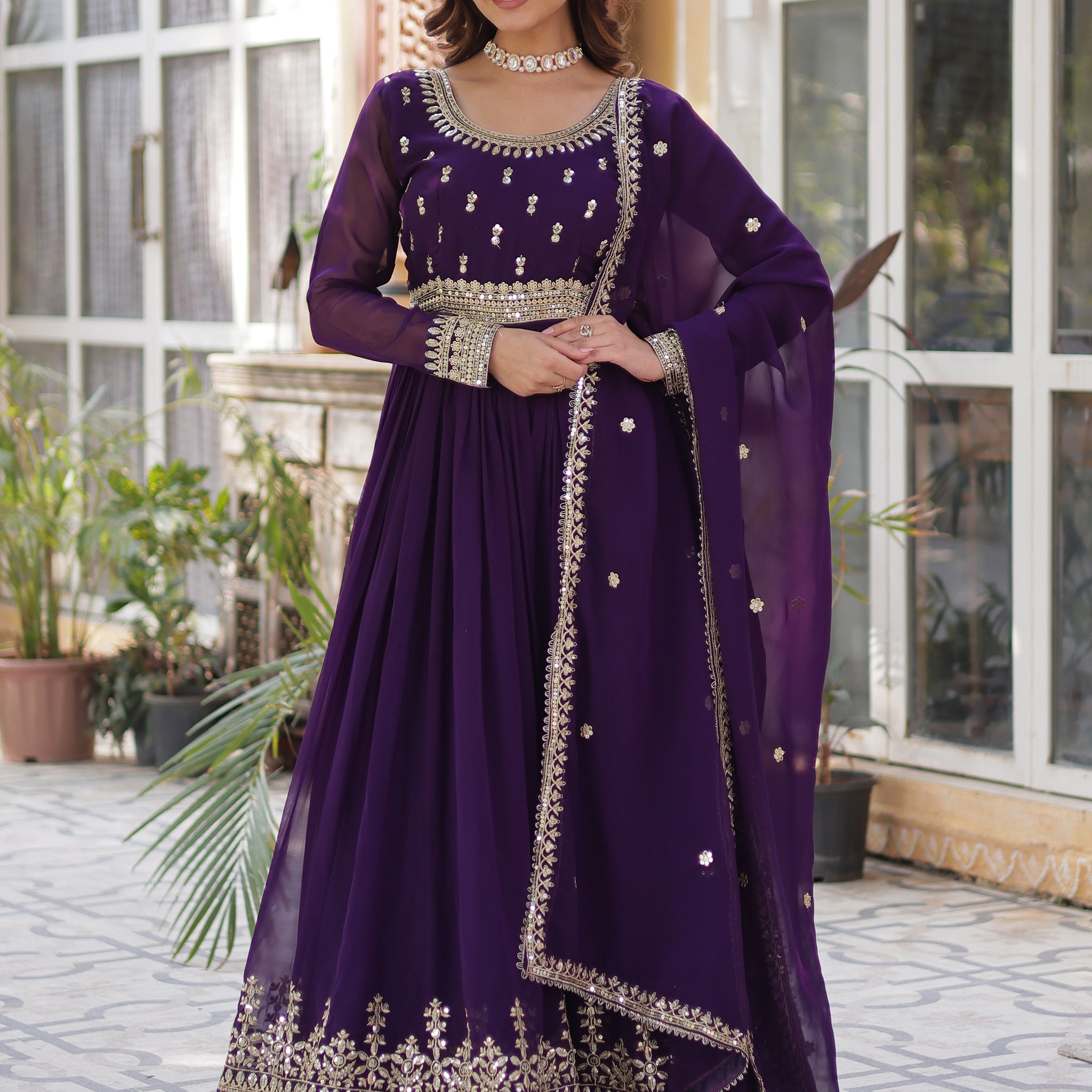 Adorable Purple Zari Embroidered Georgette Festive Wear Gown