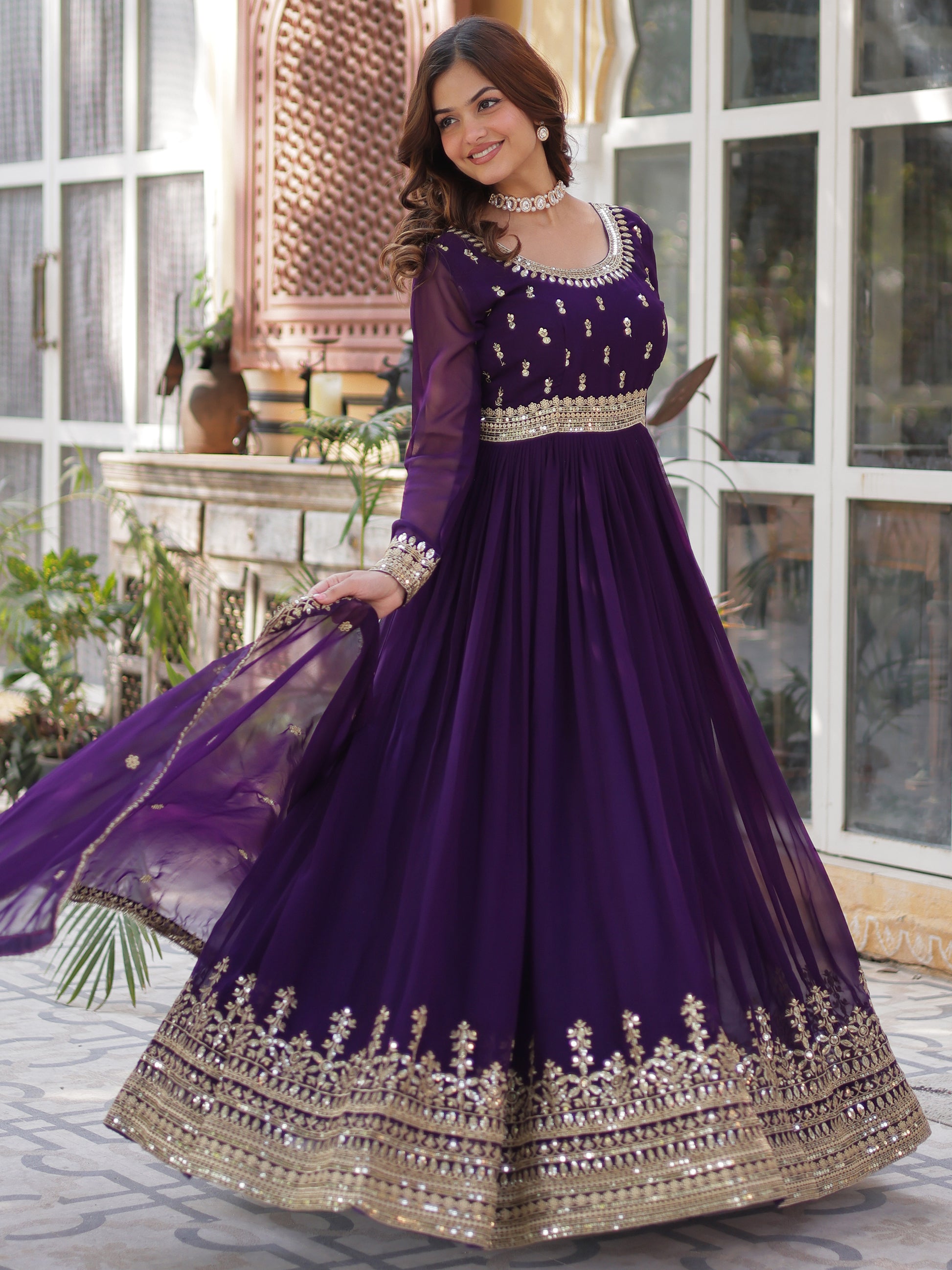 Adorable Purple Zari Embroidered Georgette Festive Wear Gown