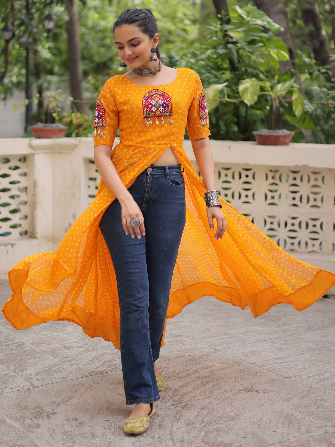 Lovely Yellow Kutchi Patch Work Georgette Navratri Wear Side Slit Kurti