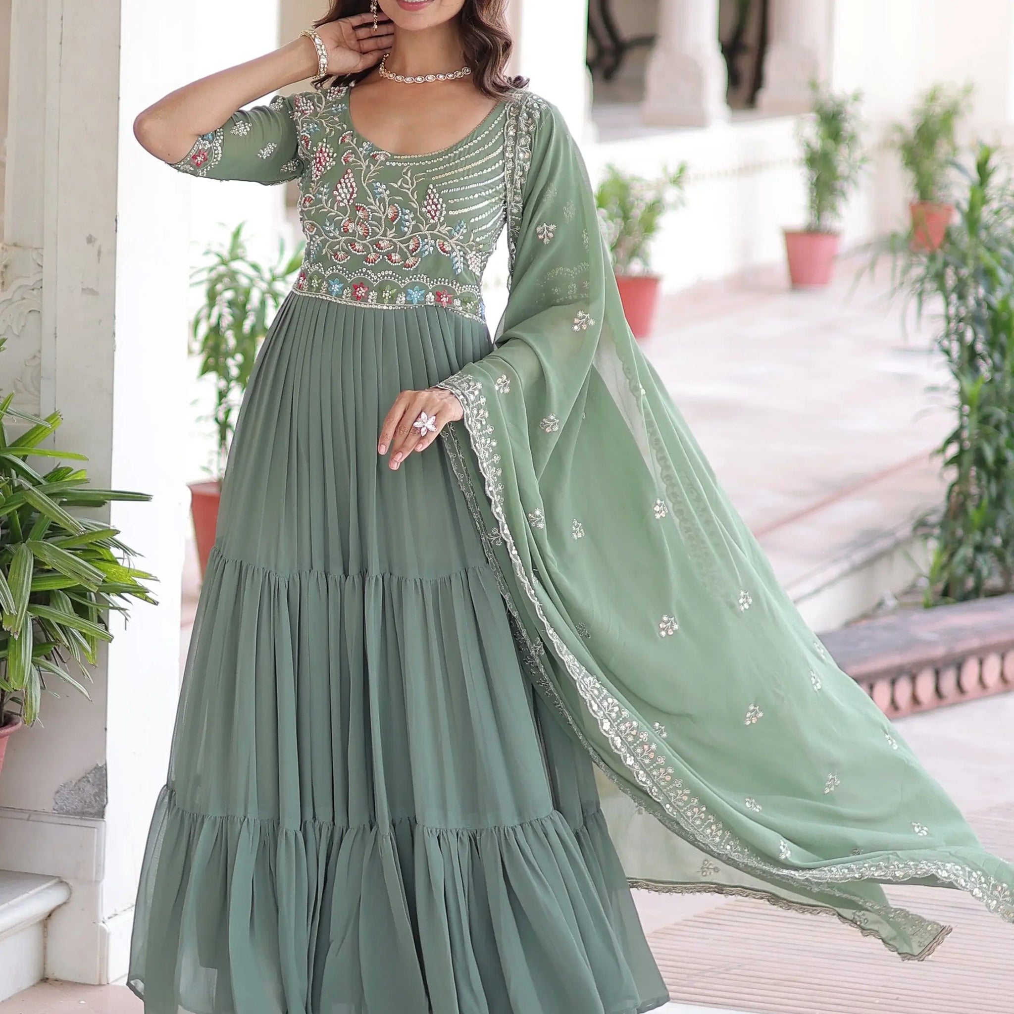 Lovely Pista Green Sequins Georgette Mehendi Wear Gown With Dupatta