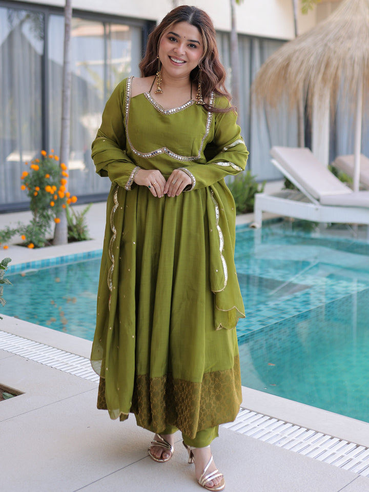 Great Olive Green Lace Border Chanderi Mehendi Wear Gown With Dupatta