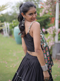 Attractive Black Patchwork Cotton Navratri Wear Lehenga Choli