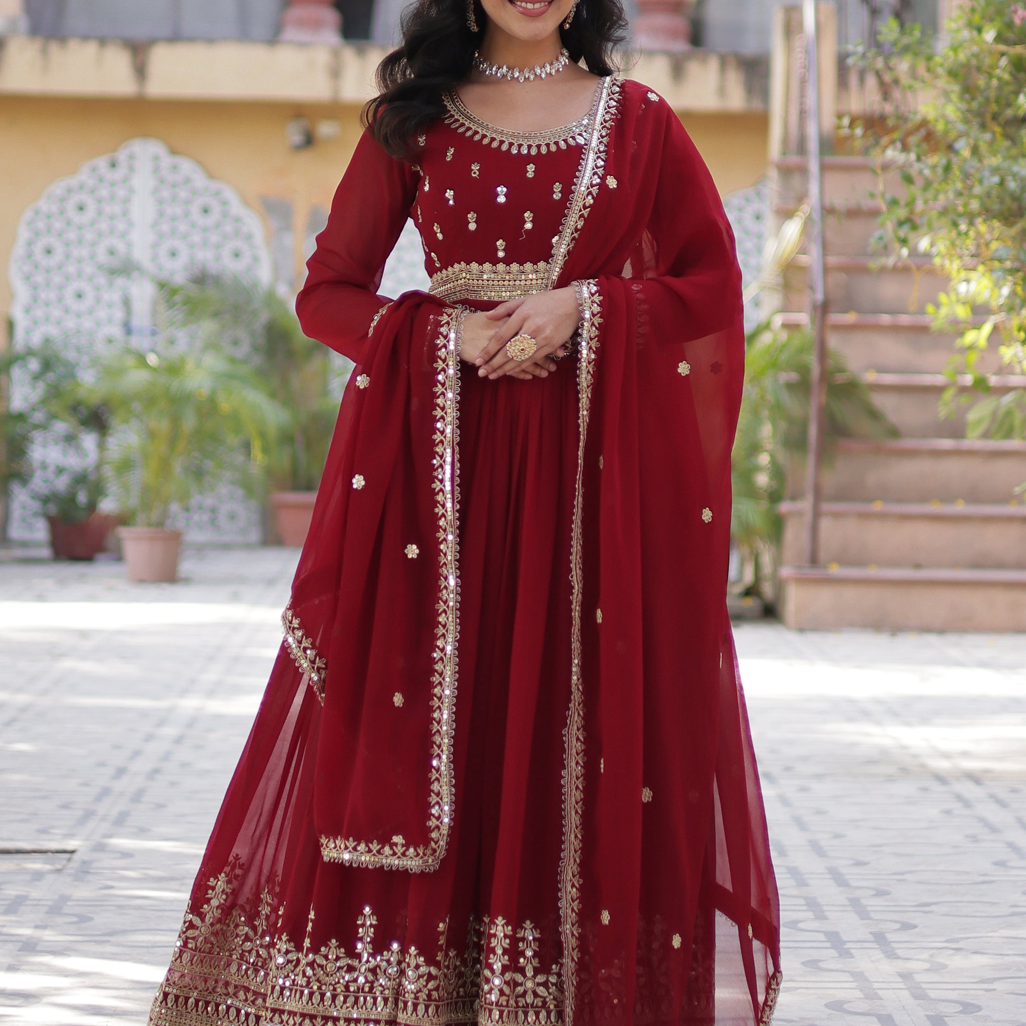 Gorgeous Maroon Zari Embroidered Georgette Wedding Wear Gown