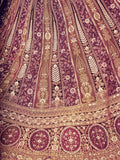 Enchanting Wine Thread Work Net Engagement Wear Lehenga Choli