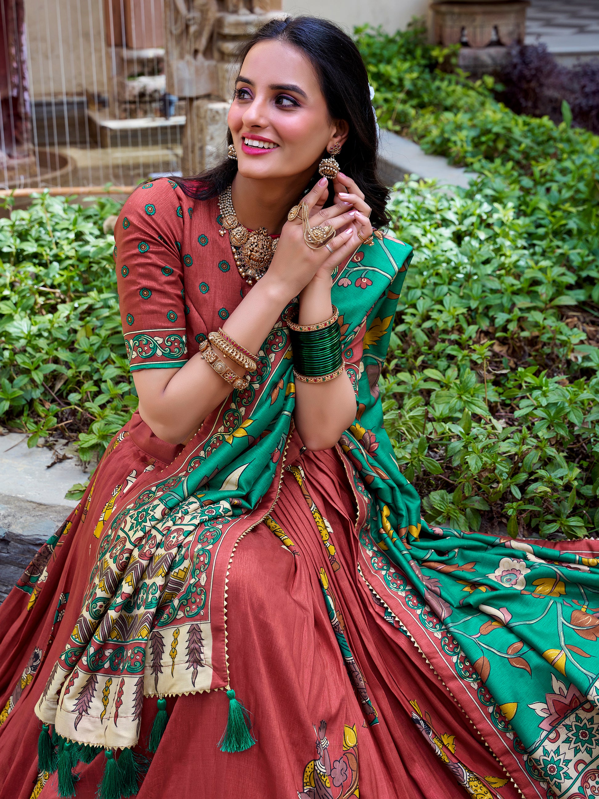 Attractive Coral Red Kalamkari Printed Silk Traditional Lehenga Choli