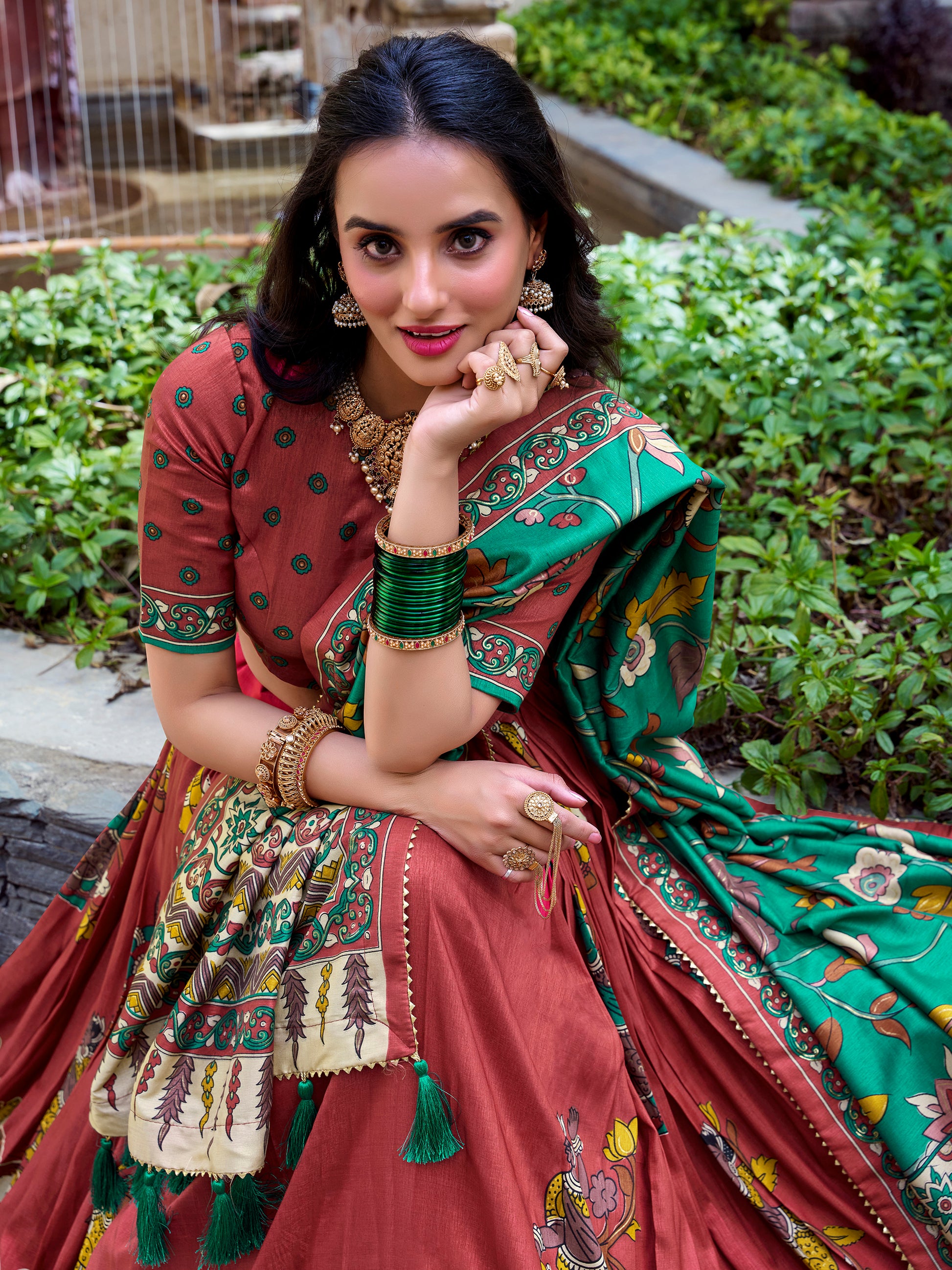 Attractive Coral Red Kalamkari Printed Silk Traditional Lehenga Choli