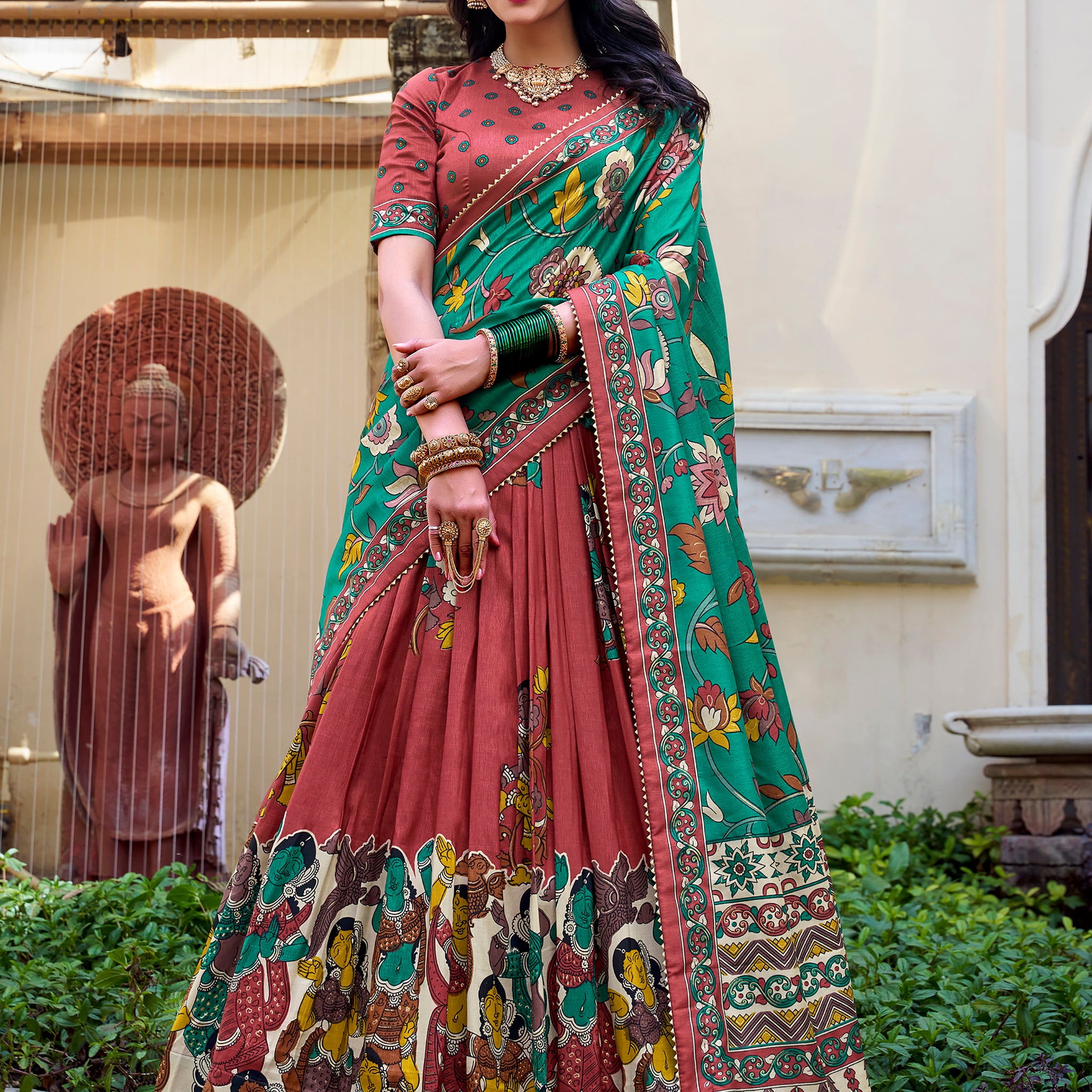 Attractive Coral Red Kalamkari Printed Silk Traditional Lehenga Choli