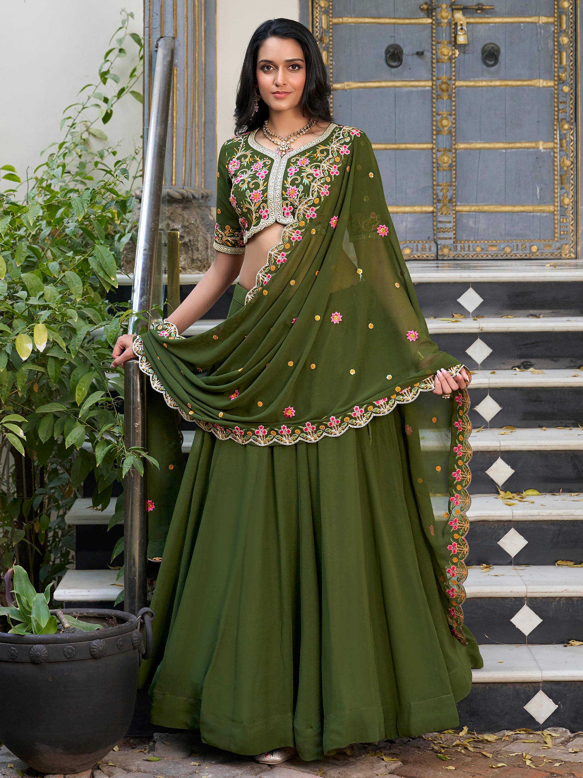 Beautiful Green Thread Work Georgette Mehendi Wear Lehenga Choli