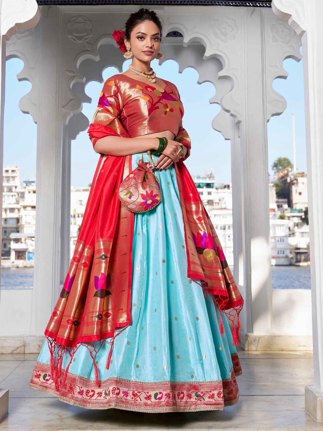 Alluring Sky Blue Zari Weaving Silk Paithani Lehenga Choli