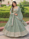 Striking Green Sequins Embroidered Georgette Festive Wear Lehenga Choli With Dupatta