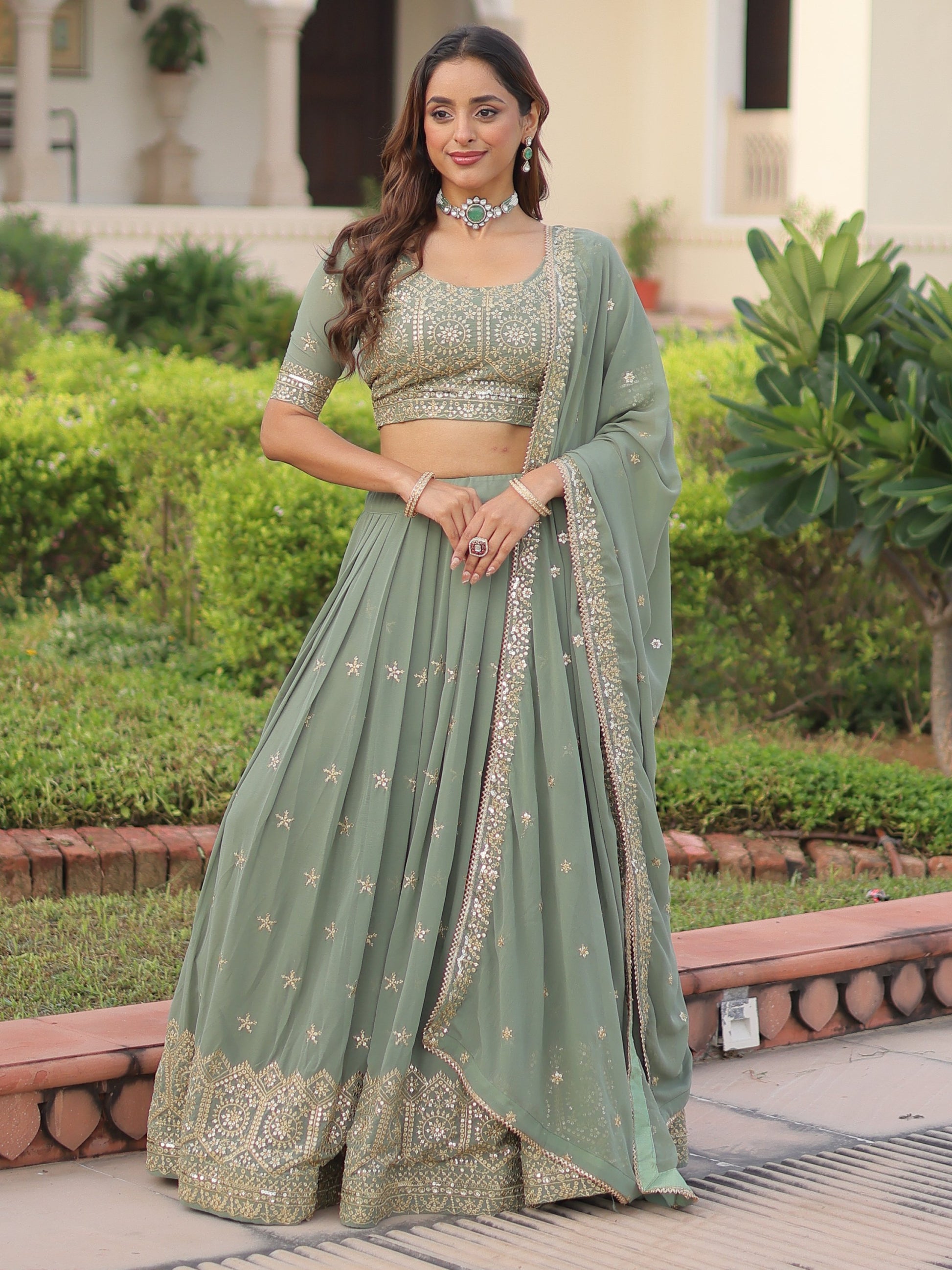 Striking Green Sequins Embroidered Georgette Festive Wear Lehenga Choli With Dupatta